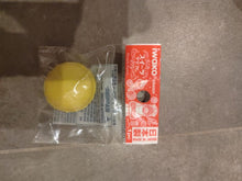 Load image into Gallery viewer, Gomme japonaise Iwako en forme de macaron jaune dans son emballage individuel