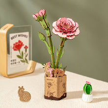 Load image into Gallery viewer, Rowood Pink Carnation - Fleur en bois dans son pot en papier
