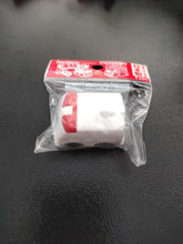 Load image into Gallery viewer, Gomme japonaise Iwako en forme d'ambulance blanche et rouge dans son emballage.
