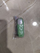 Load image into Gallery viewer, Gomme parfumée en forme de doigt de monstre vert Legami sous son emballage plastique scellé.
